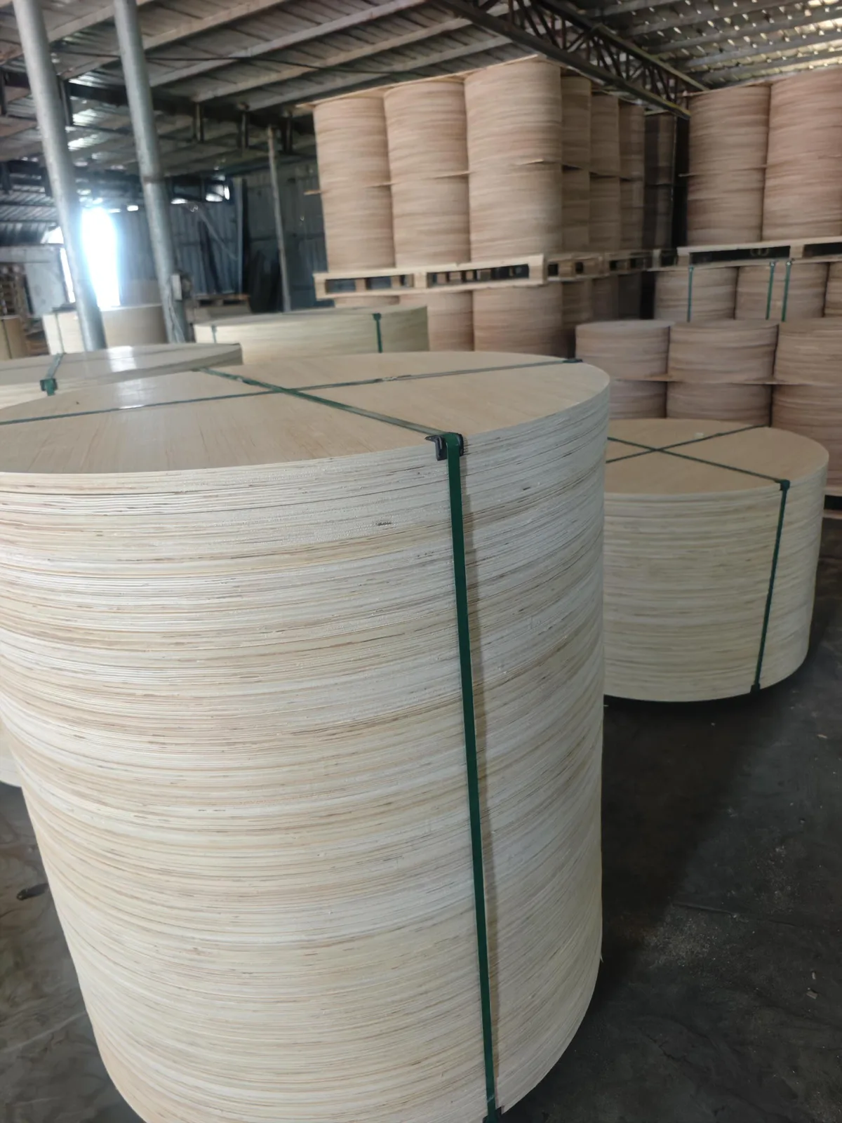 Plywood cable reel flanges stacked for production