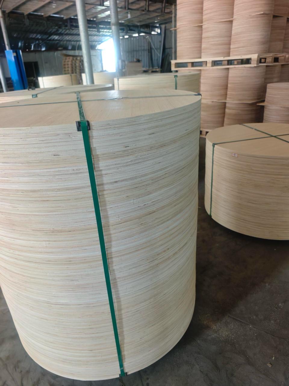 Plywood Cable Reel Flanges — Palletized flange stock in warehouse