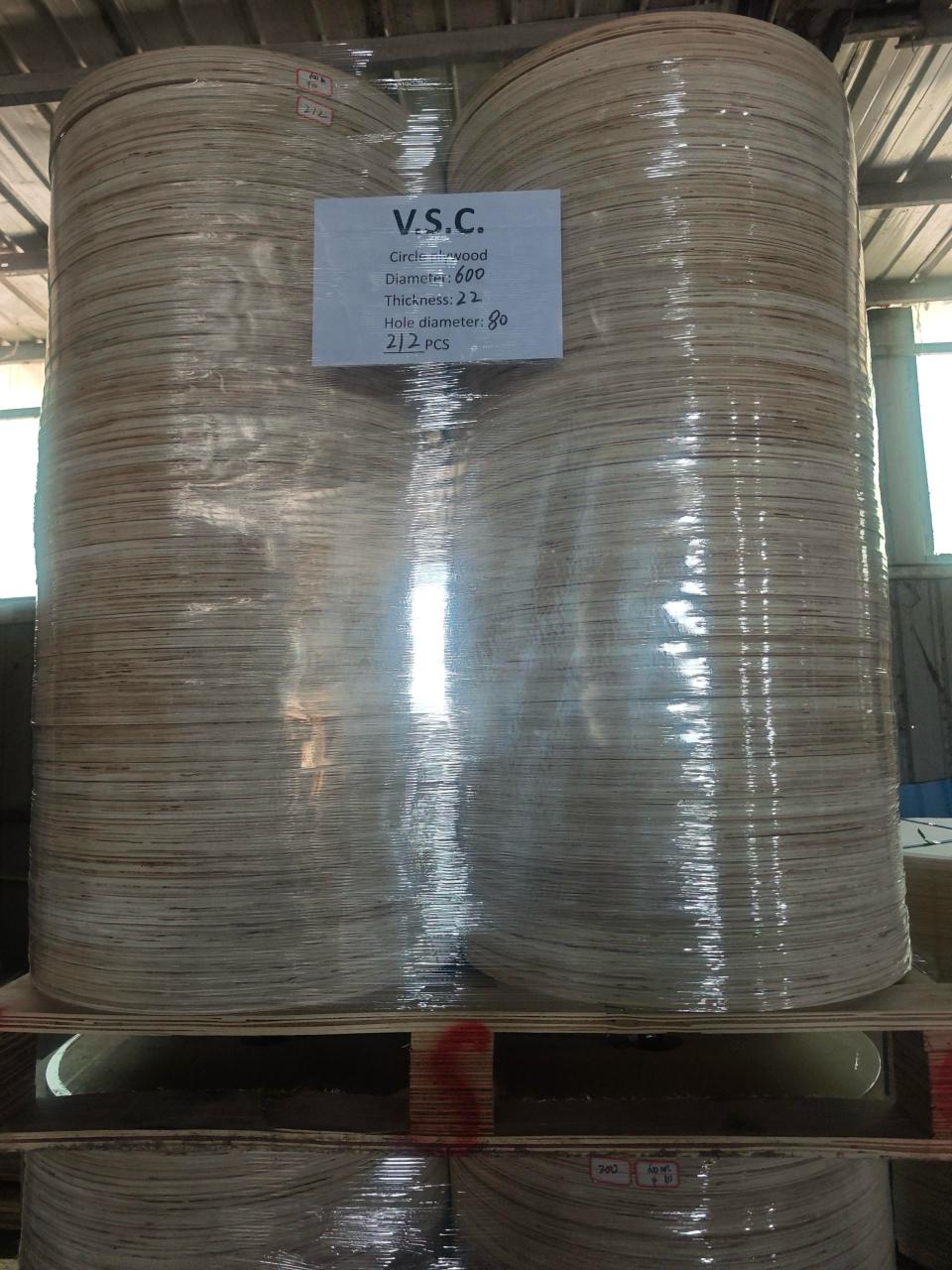 Plywood Cable Reel Flanges — Stacked plywood sheets ready for CNC processing