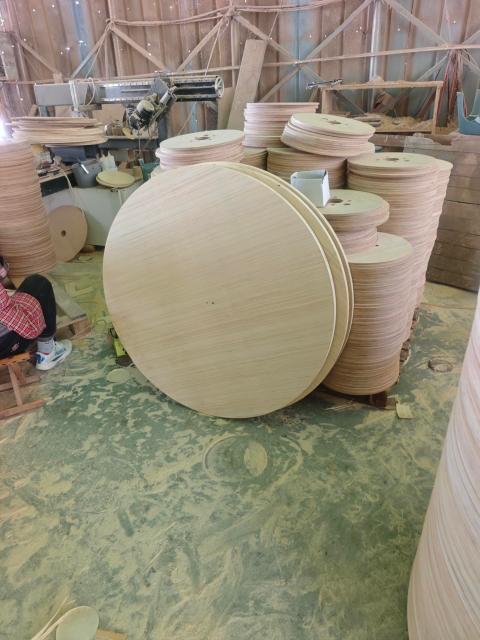 Plywood Cable Reel Flanges — Round flanges stacked in production workshop