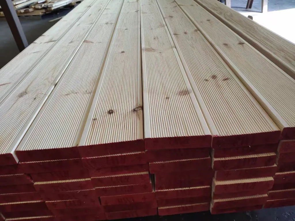 Stack of Siberian larch decking boards