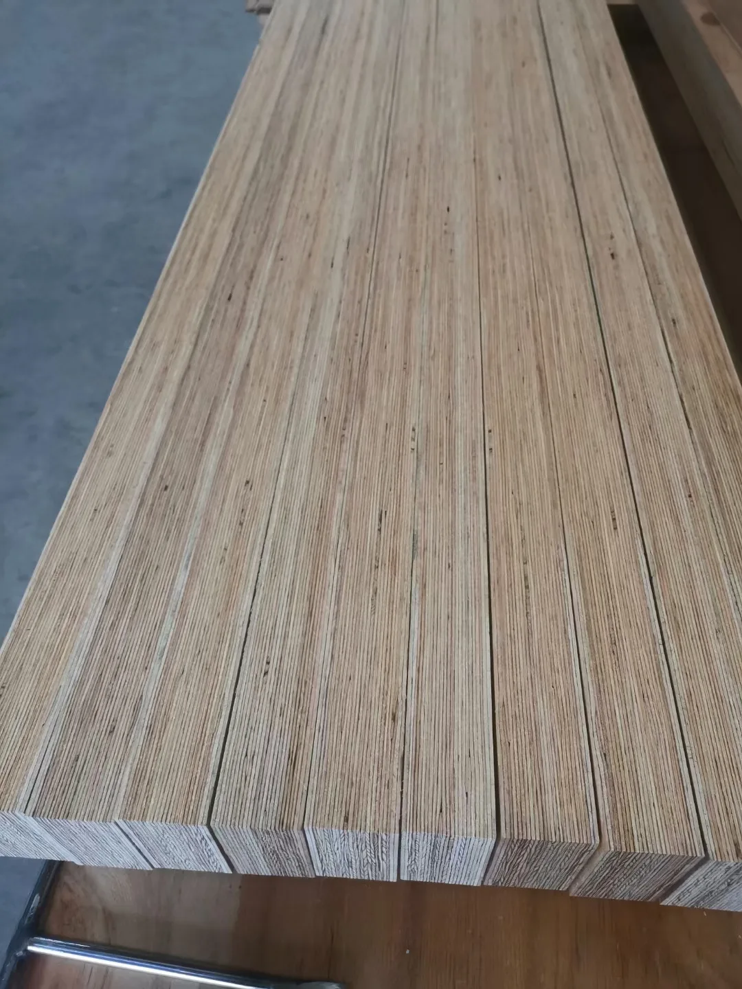 End section of laminated veneer lumber construction
